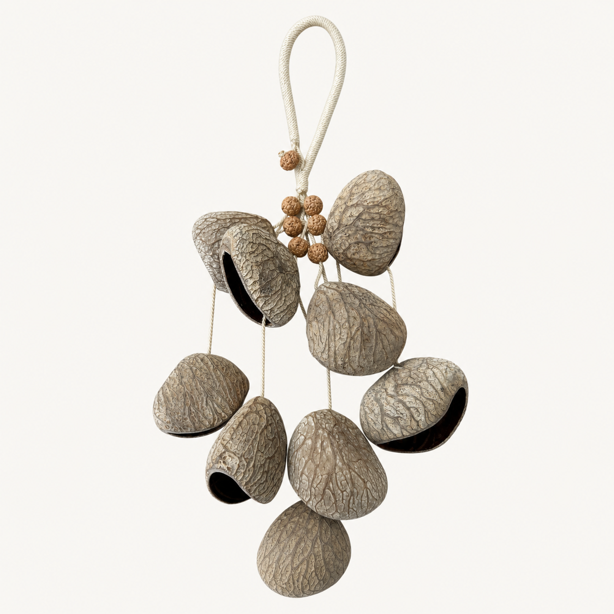 YUNOVA Dark Fruit Shell handmade botanical wind chime on a clean studio background