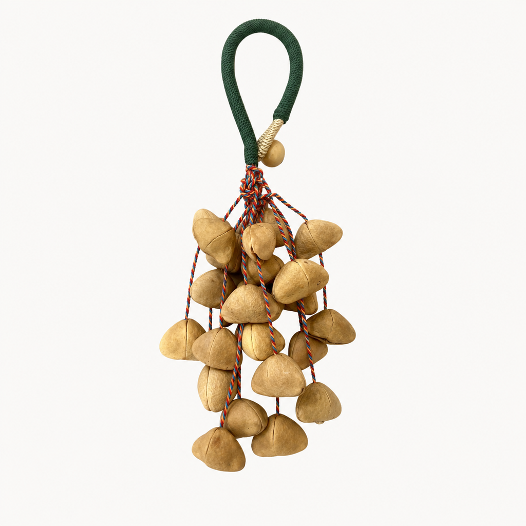 YUNOVA Golden Botanical Shell handmade wind chime on a clean studio background
