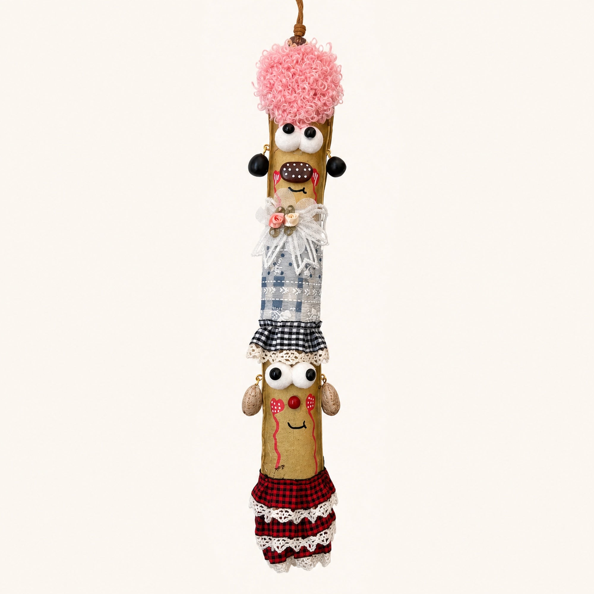 YUNOVA Sword Bean Pod Doll handmade hanging ornament on a clean studio background