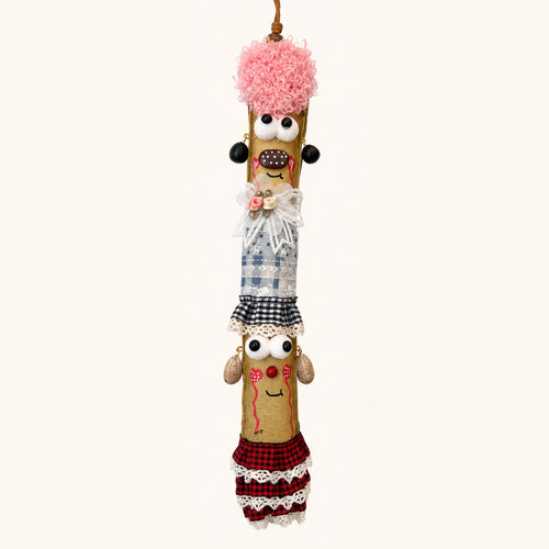 YUNOVA Sword Bean Pod Doll handmade hanging ornament on a clean studio background