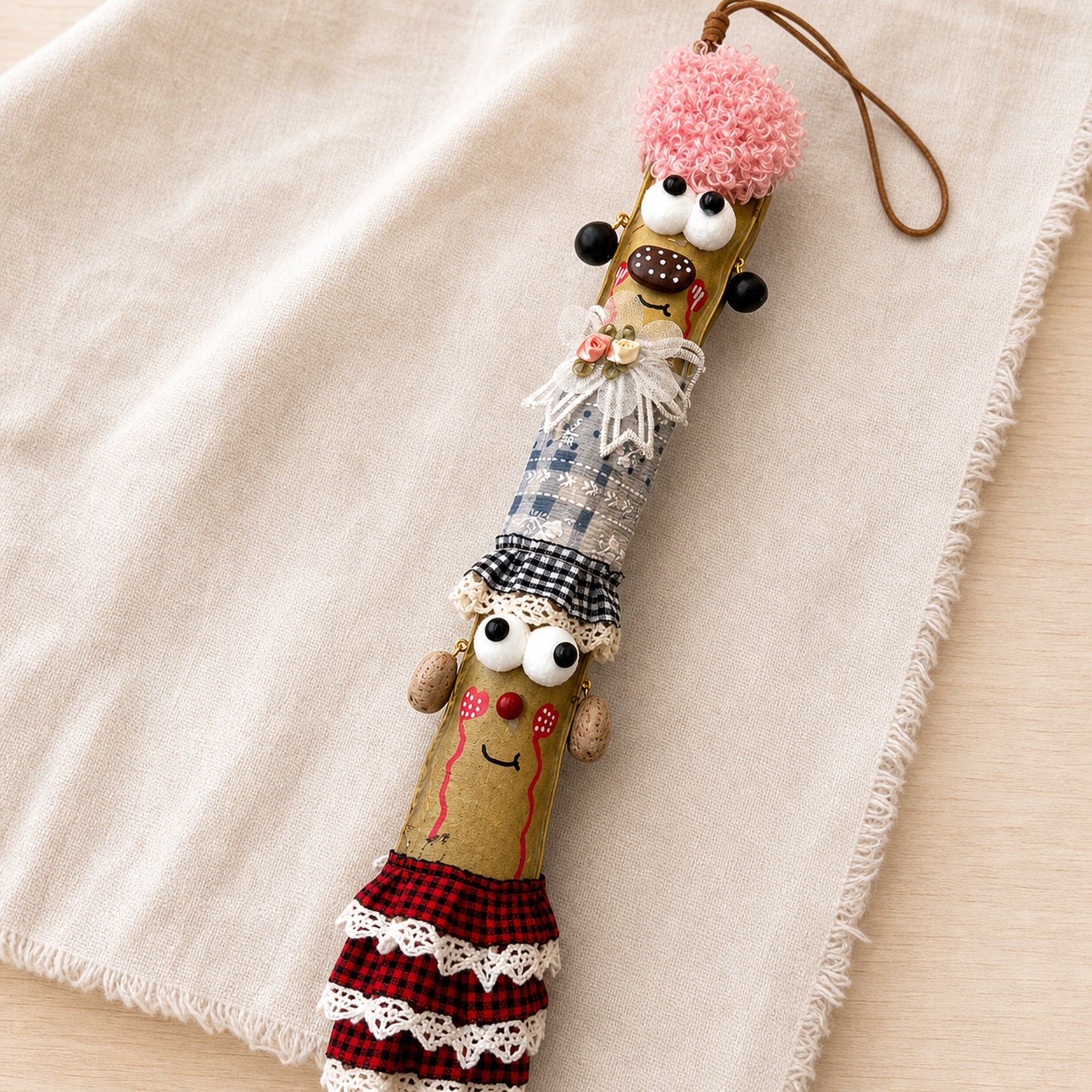 Close-up material detail of YUNOVA Sword Bean Pod Doll handmade ornament